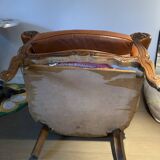 Fauteuil cuir type chesterfield