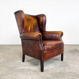Vintage sheep leather wingback armchair Goor