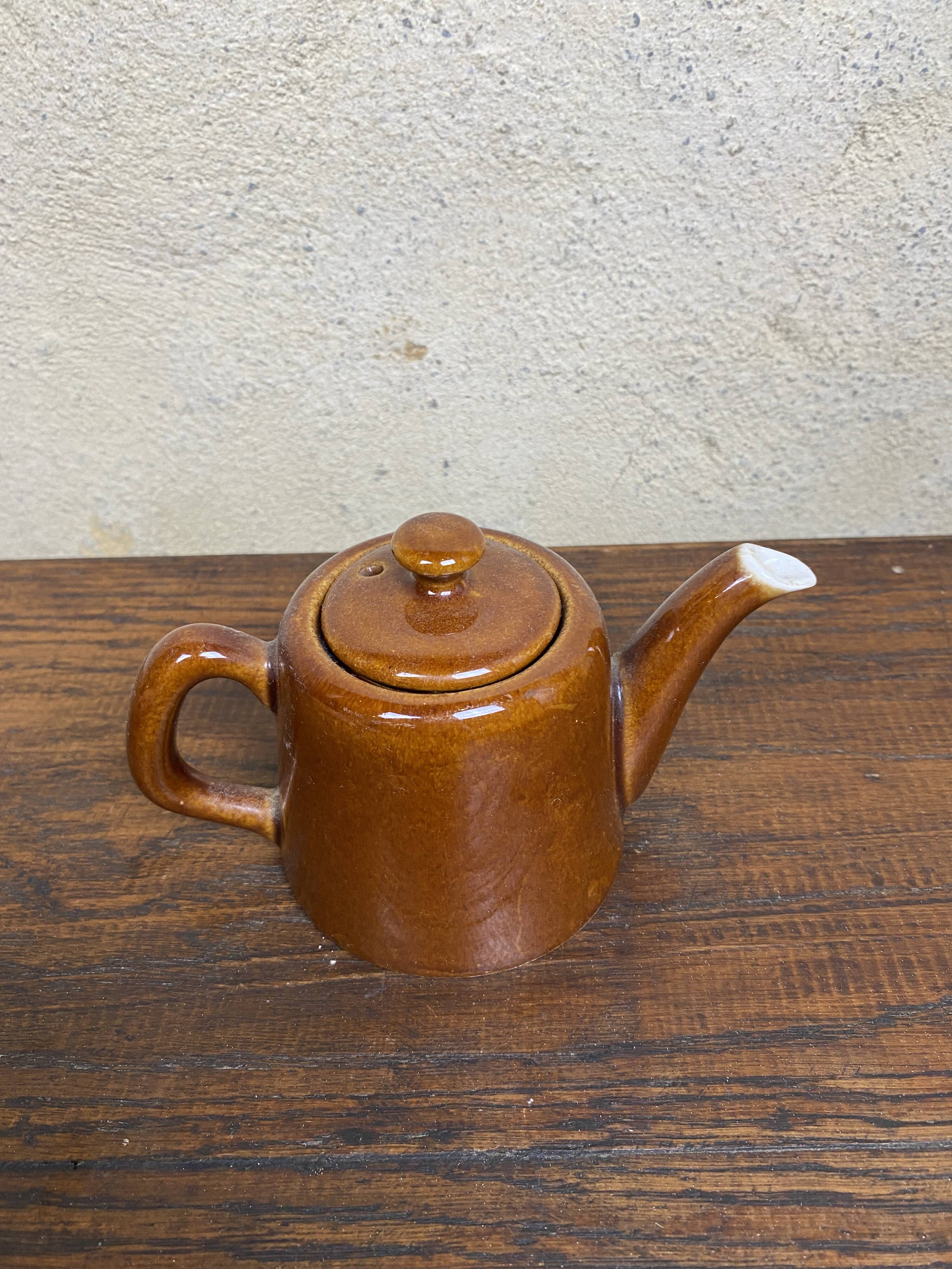 Small vintage brown teapot