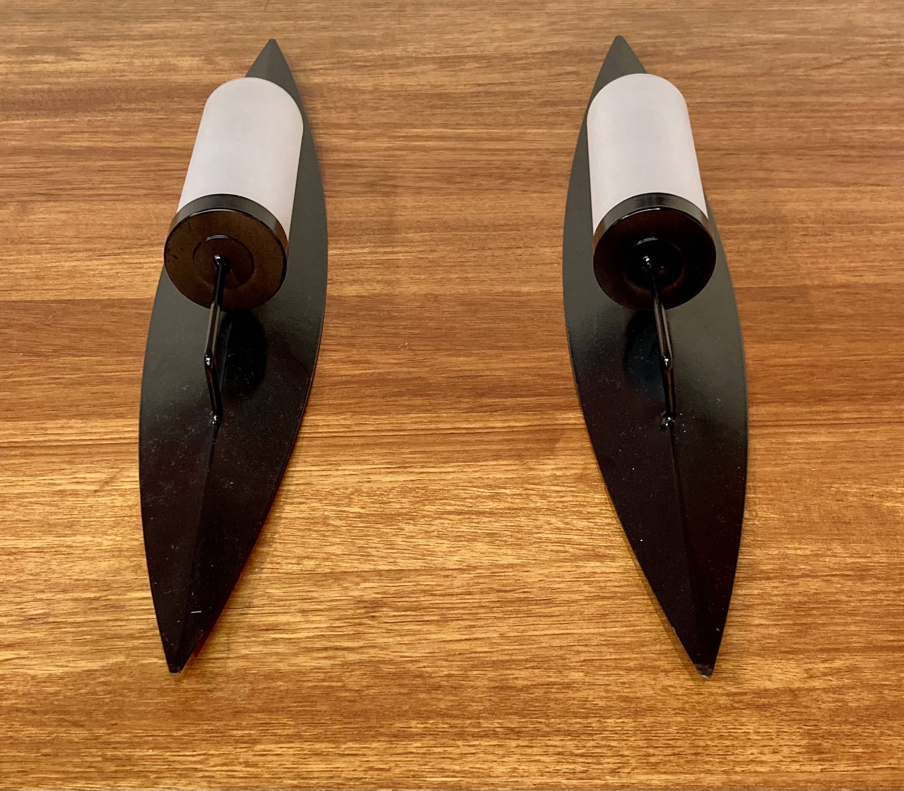 PAIR OF SCANDINAVIAN DESIGN METAL AND GLASS CANDLE HOLDERS.