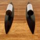 PAIR OF SCANDINAVIAN DESIGN METAL AND GLASS CANDLE HOLDERS.