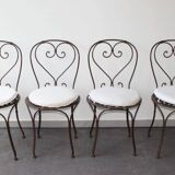 Set of 4 wrought iron chairs.