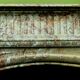 Louis XIV-style fireplace has 19th century veined pink marble hood