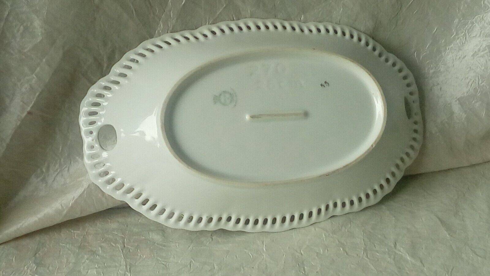 Openwork porcelain basket with fruit still life decor