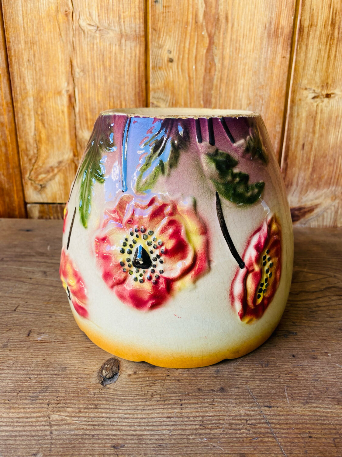 Earthenware cache pot with slip decoration.