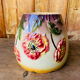 Earthenware cache pot with slip decoration.