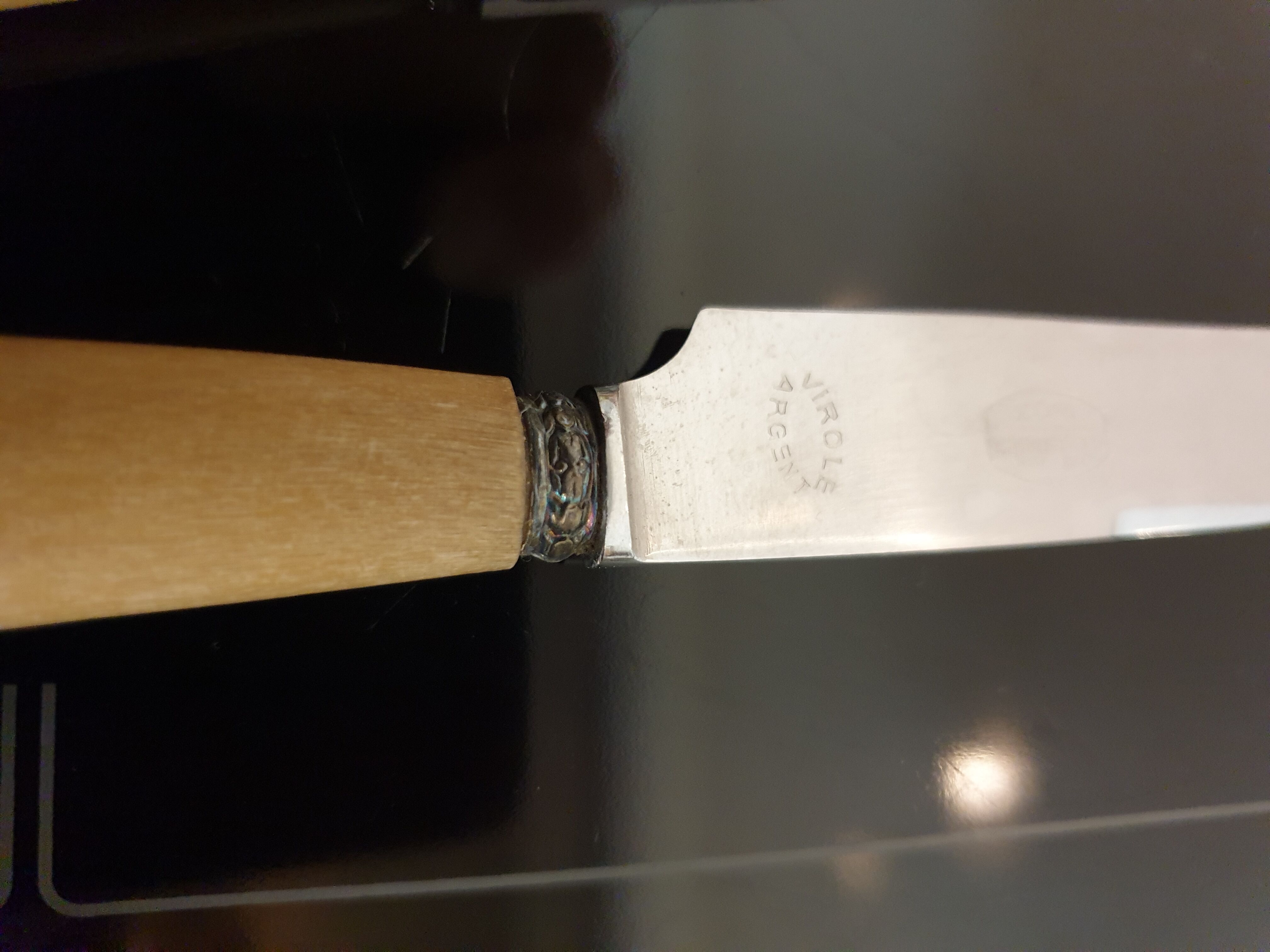10 couteaux en corne virole en argent