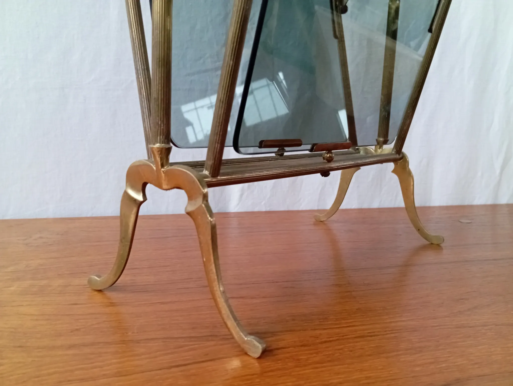 Neo-classical brass magazine rack in the spirit of Maison Jansen.