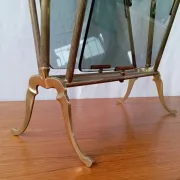Neo-classical brass magazine rack in the spirit of Maison Jansen.