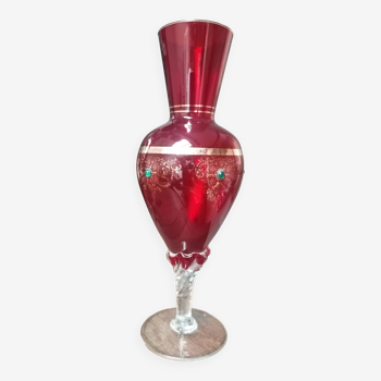 Red vase with gold decoration