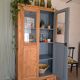 Old glass-fronted wooden library – blue interior