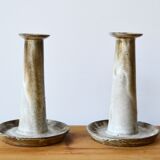 Duo of sandstone candlesticks