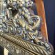 Napoleon III style mirror with gilt brass side panels
