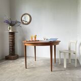 Scandinavian round teak table with extension