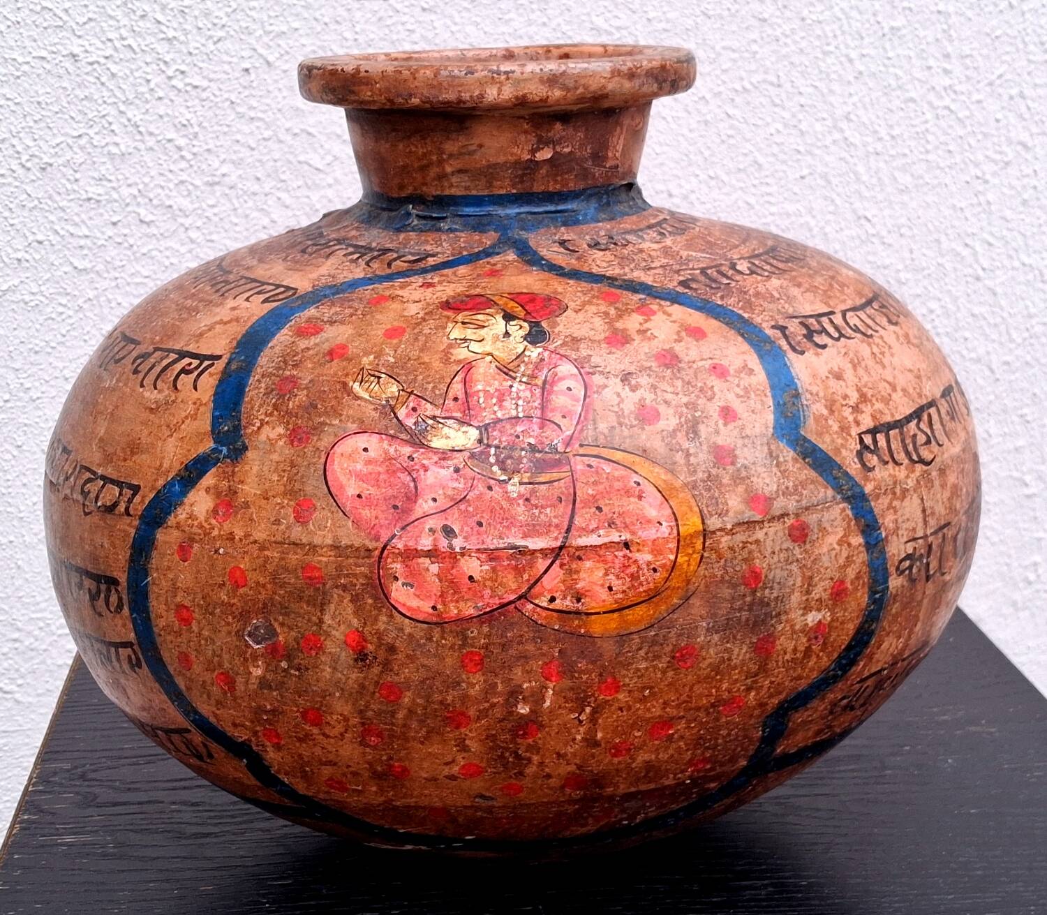 Terracotta vase, decoration of Persian figures.
