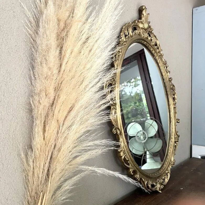 Oval mirror in Baroque style