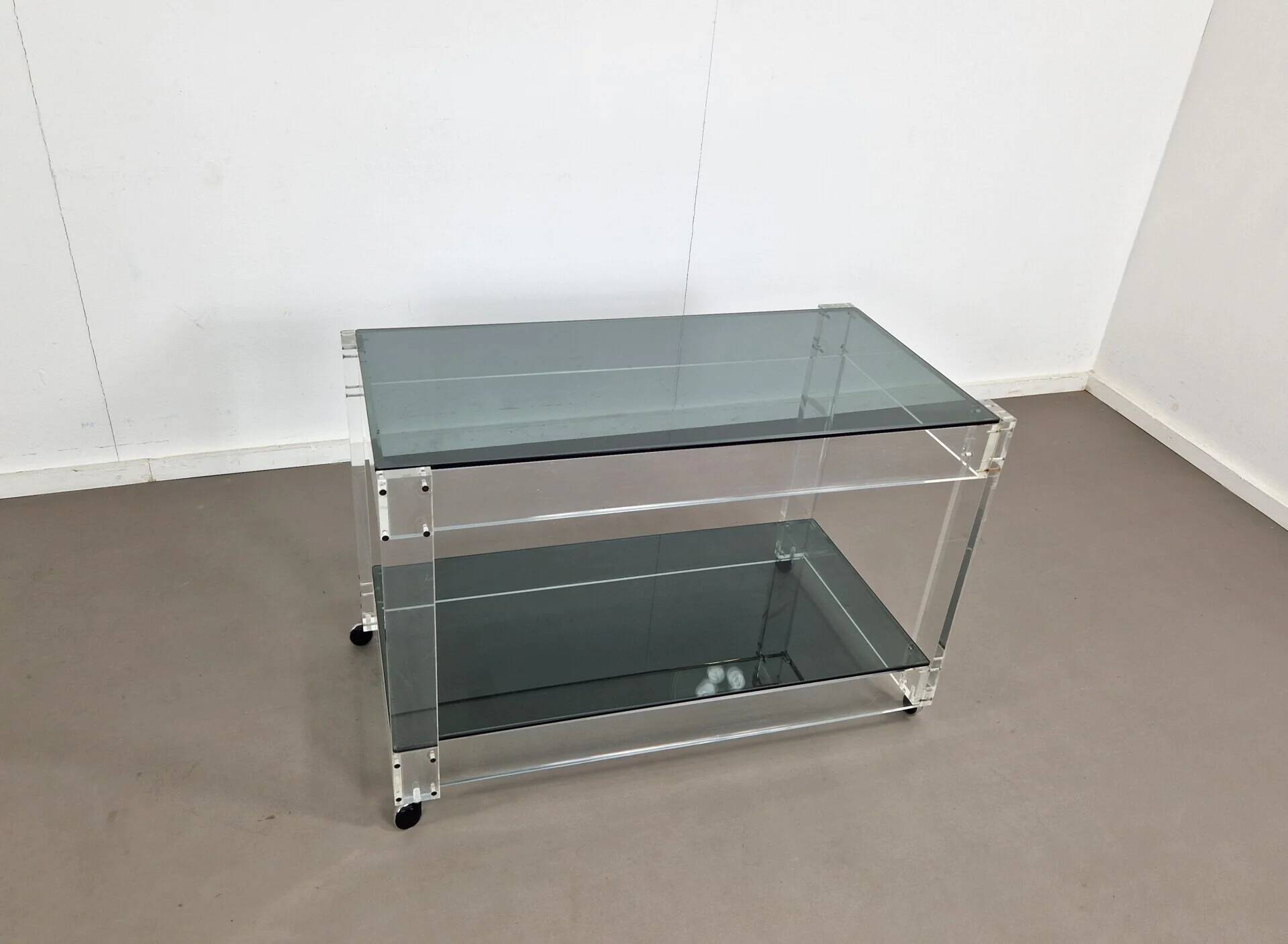 Lucite and smoked glass trolley | 1970s