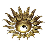 Applique ou luminaire de plafond en fer forgé doré en forme de soleil espagnol, vers les années 1950.