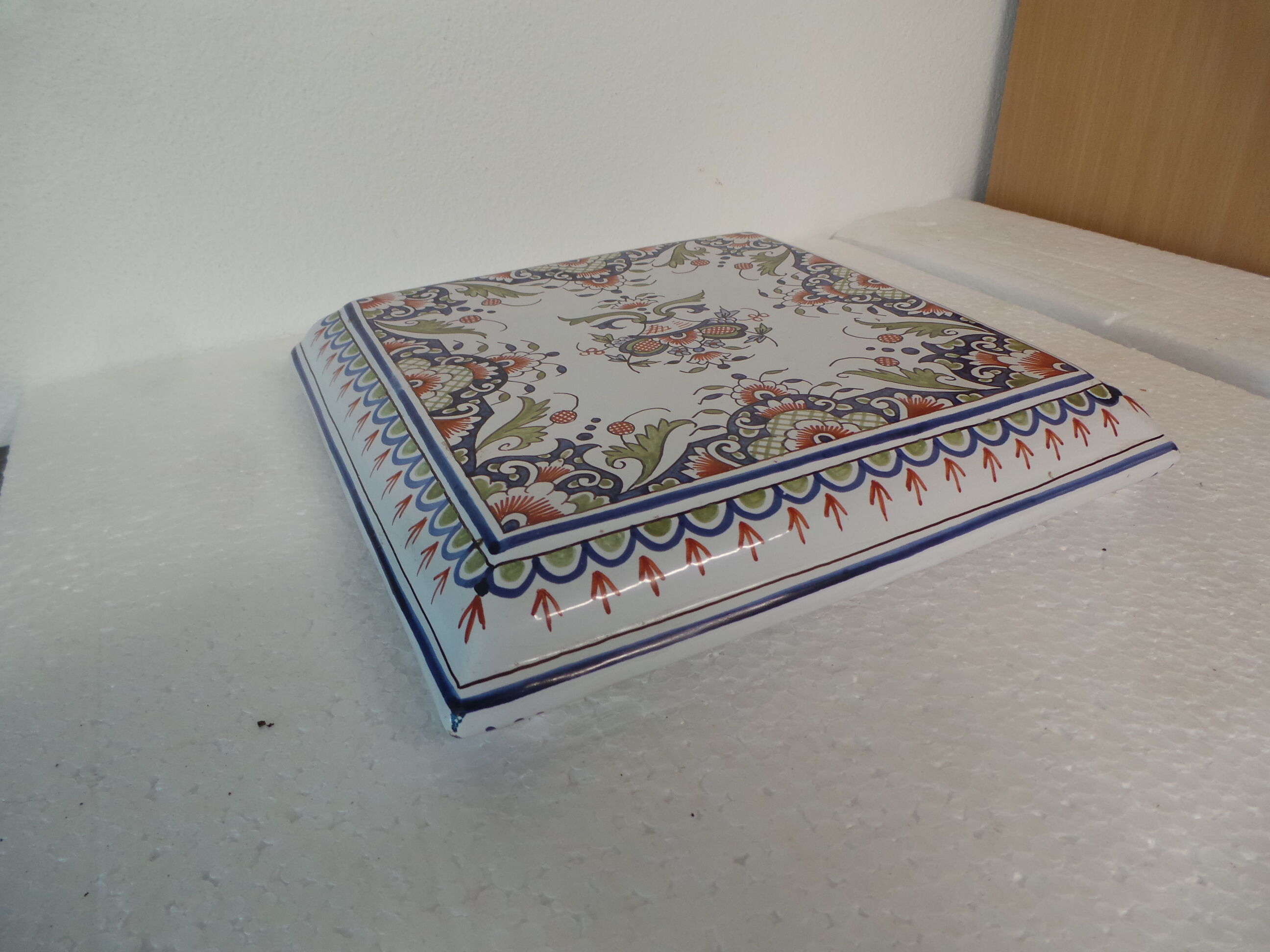 Table mat of rouen faience hand-painted floral decoration