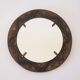 Decorative mirror in wood and gold metal