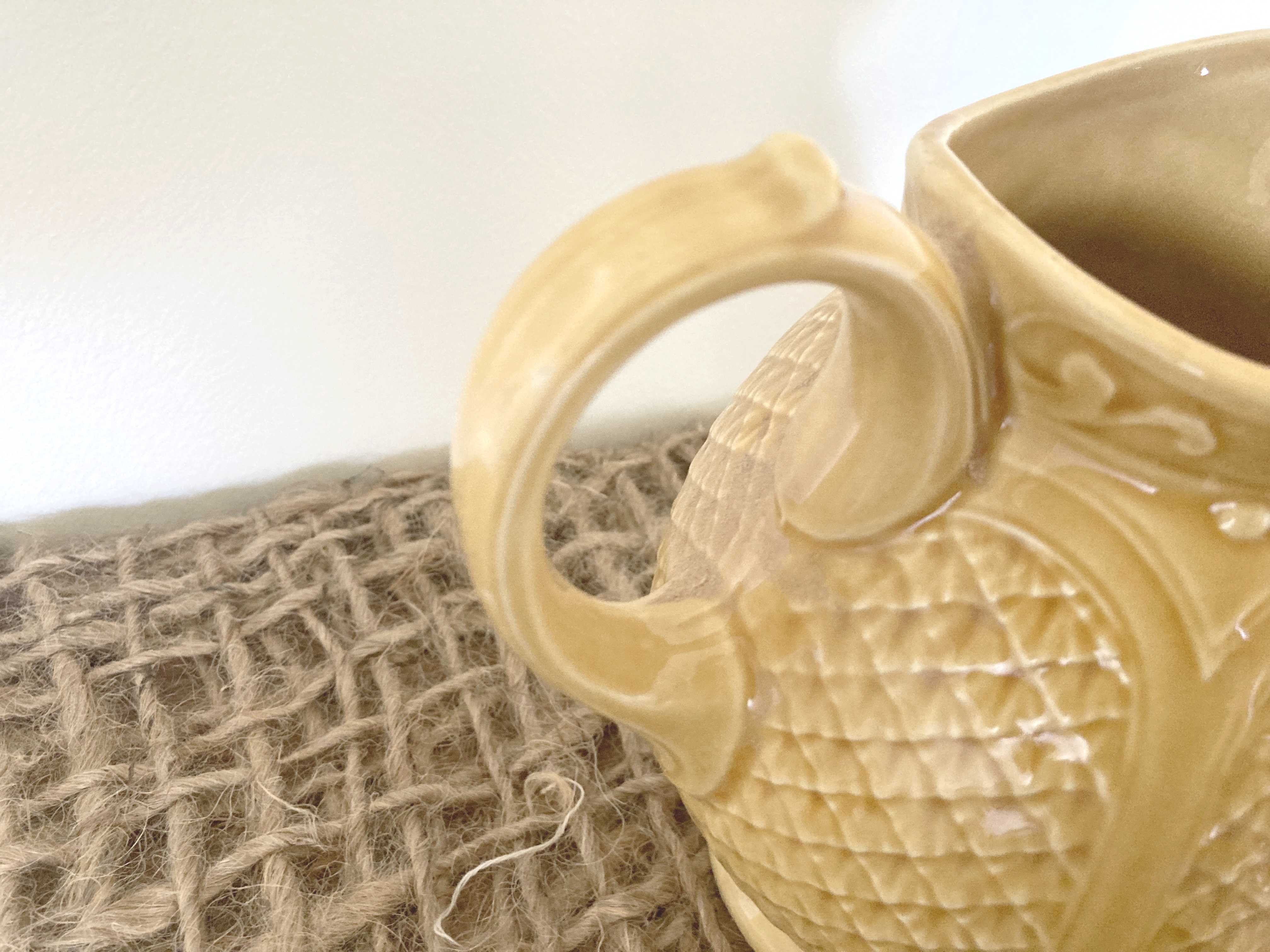 Mustard yellow ceralic pitcher