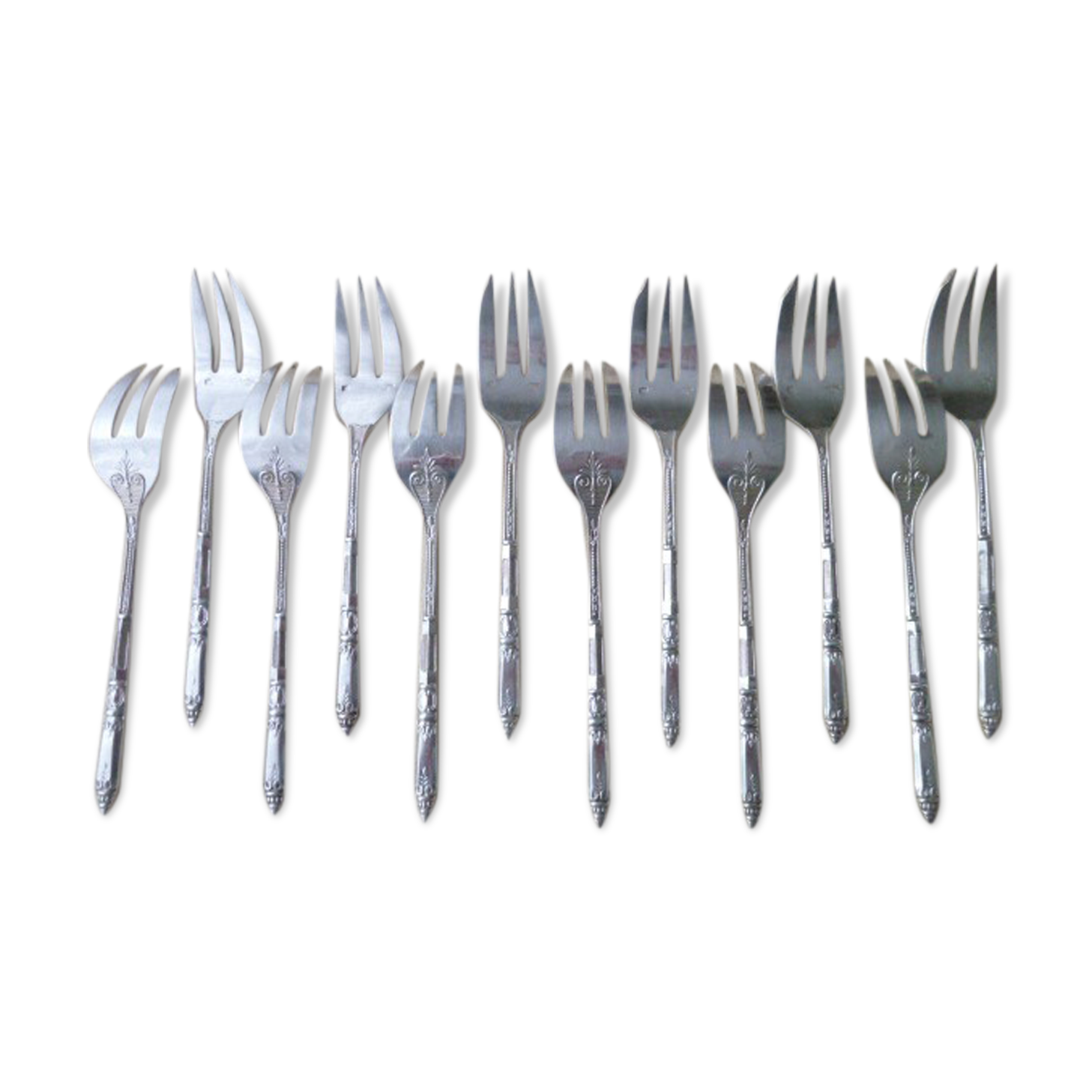 Set of 12 forks with cakes in silver metal Ercuis Russian model.