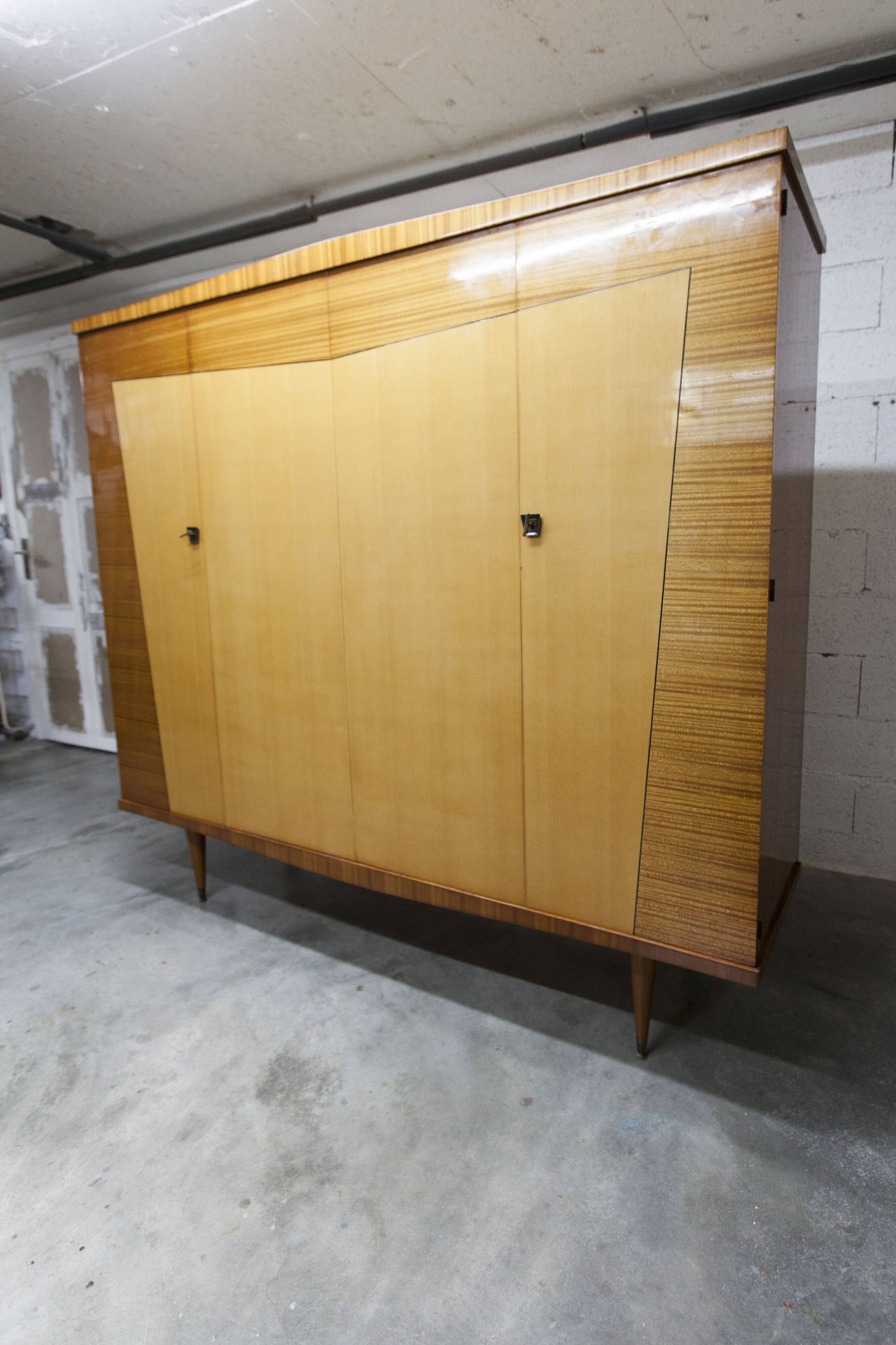 1960s Scandinavian wardrobe, blonde varnished wood, unusual, 4 doors, 3 drawers, 7 shelves.