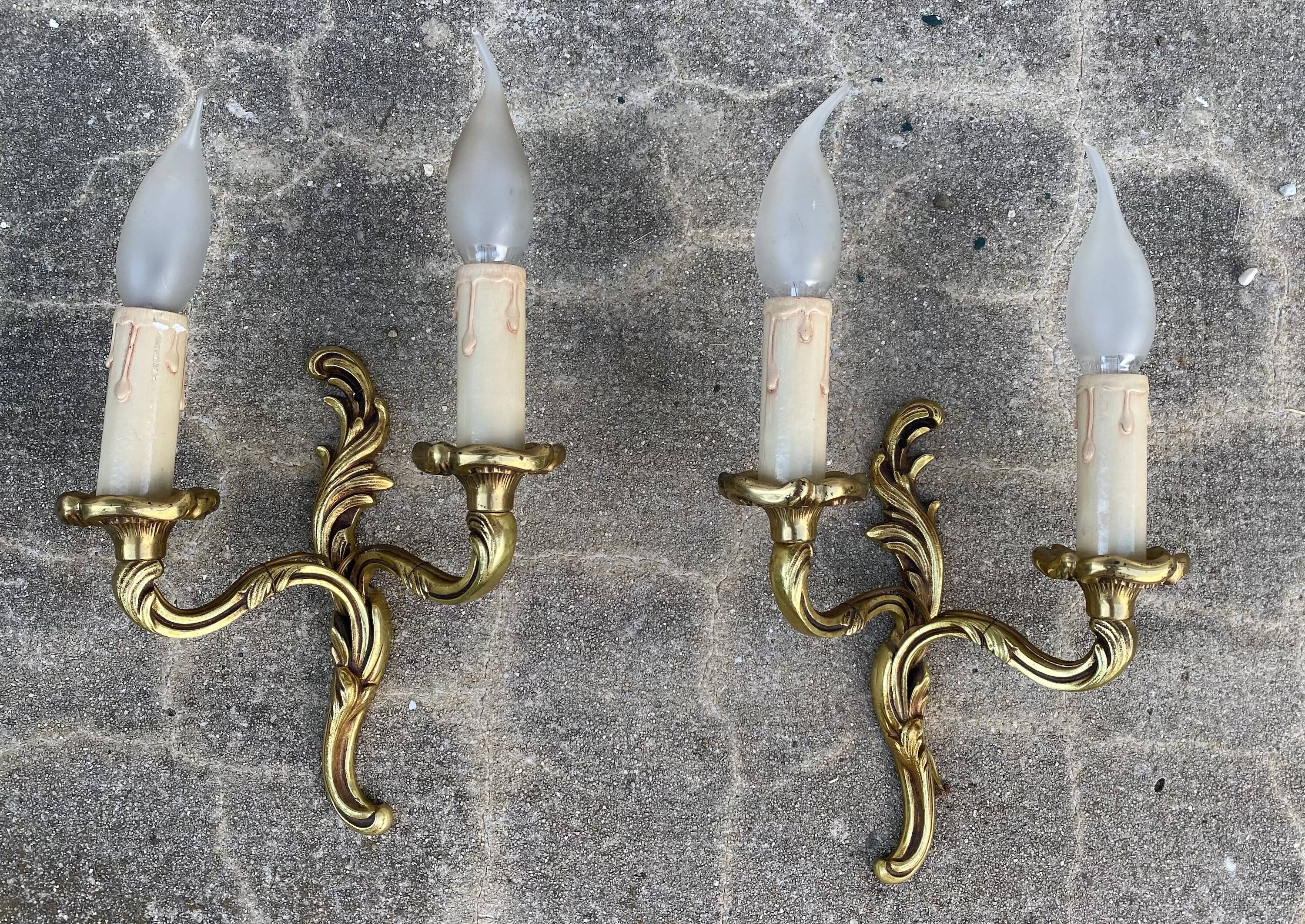 Pair of baroque gilt bronze wall lamps