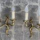 Paire de lampes d'appliques baroques en bronze doré