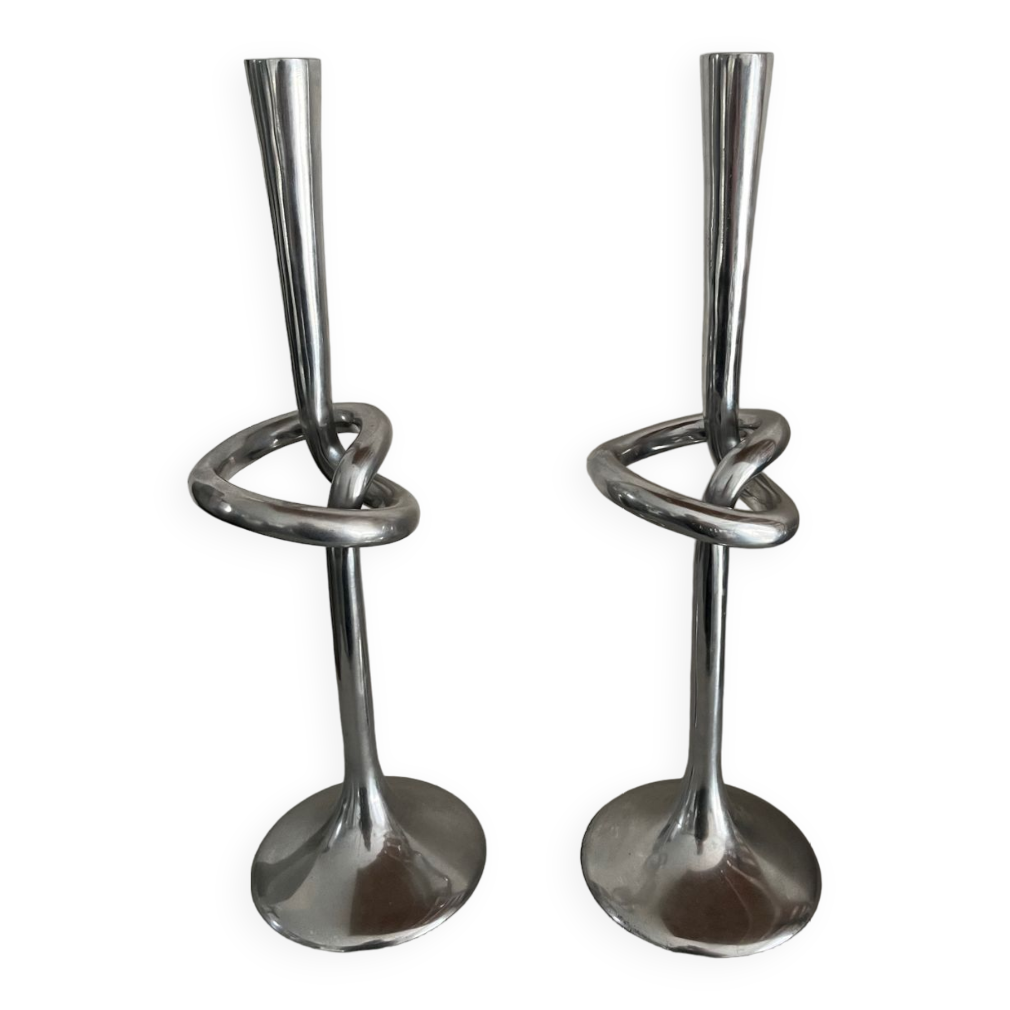 Pair of large kare design cast aluminum candlesticks