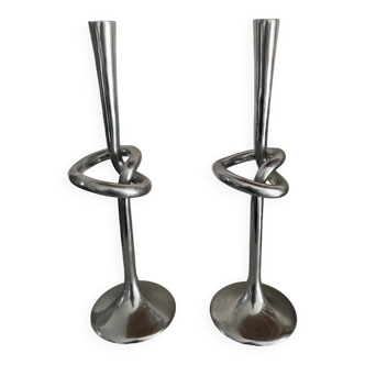 Pair of large kare design cast aluminum candlesticks