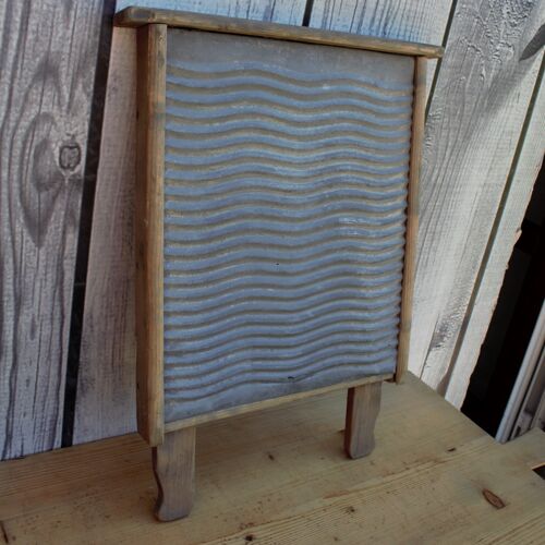 Old wooden and zinc washboard deco firm