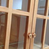 Showcase in raw wood
