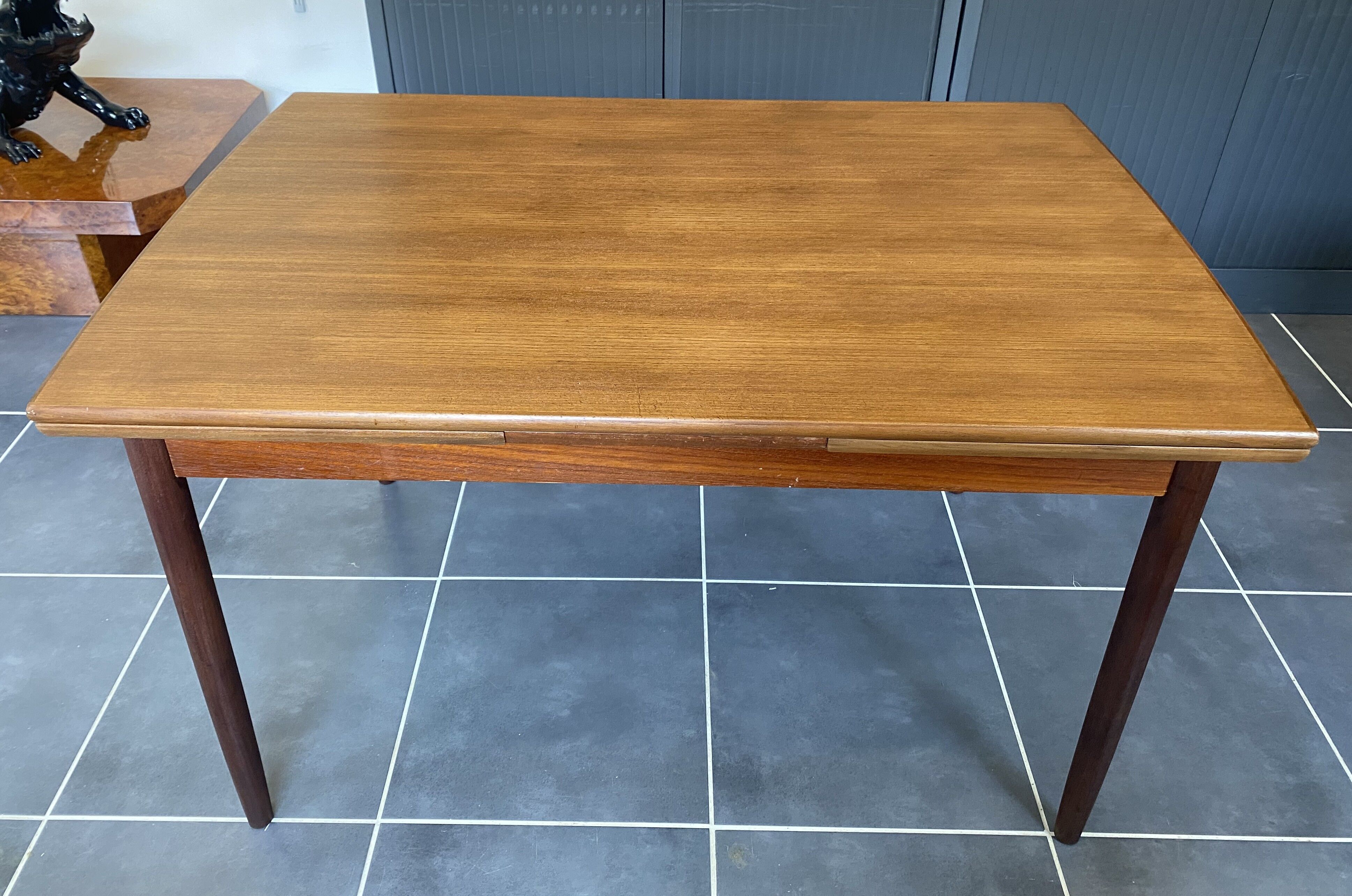 Extendable Scandinavian teak table by Johannes Andersen for Samcom Denmark.