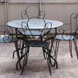 Old wrought iron garden furniture, 2 armchairs, 2 chairs and the table