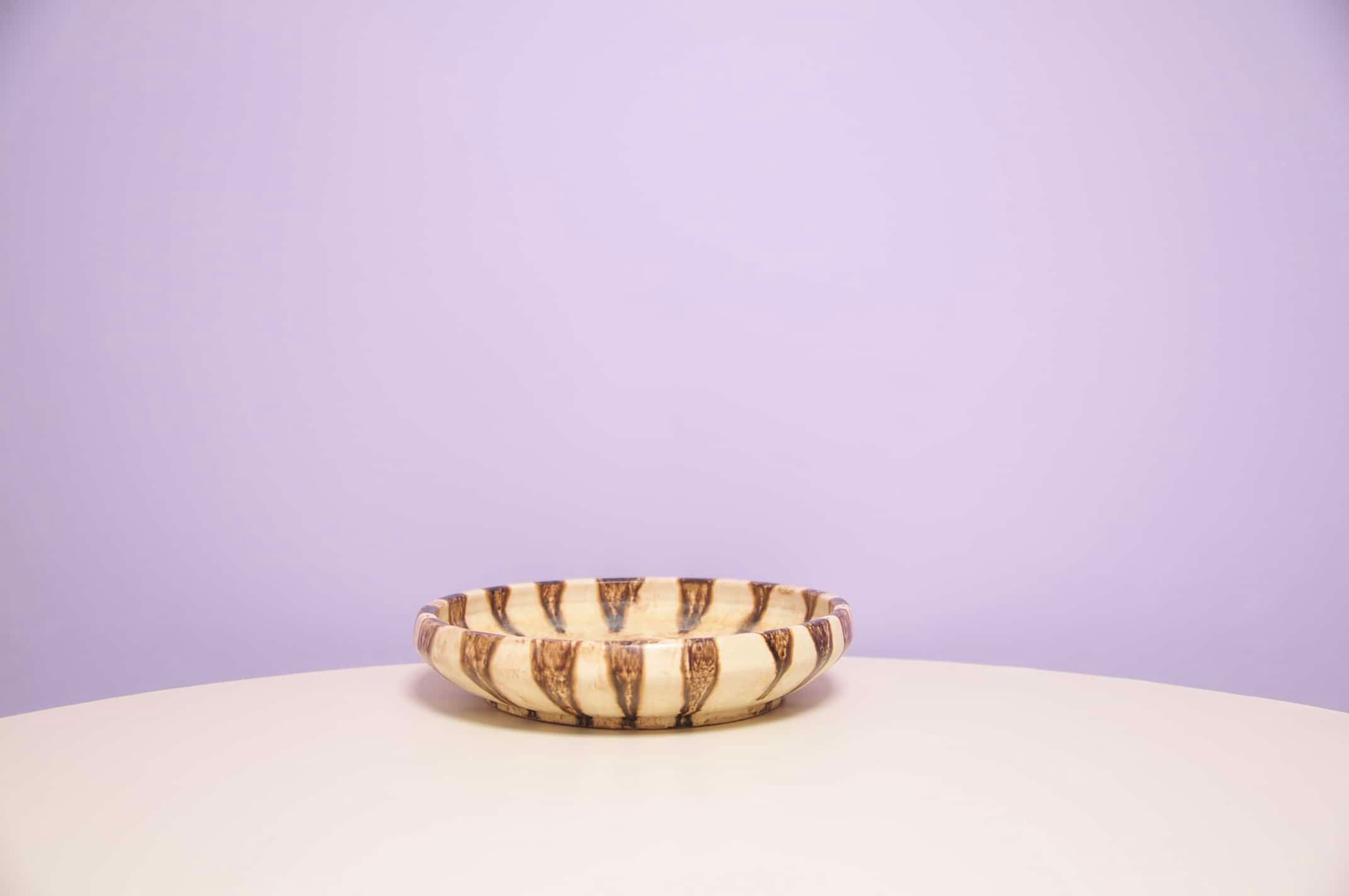 Beige round bowl with dots