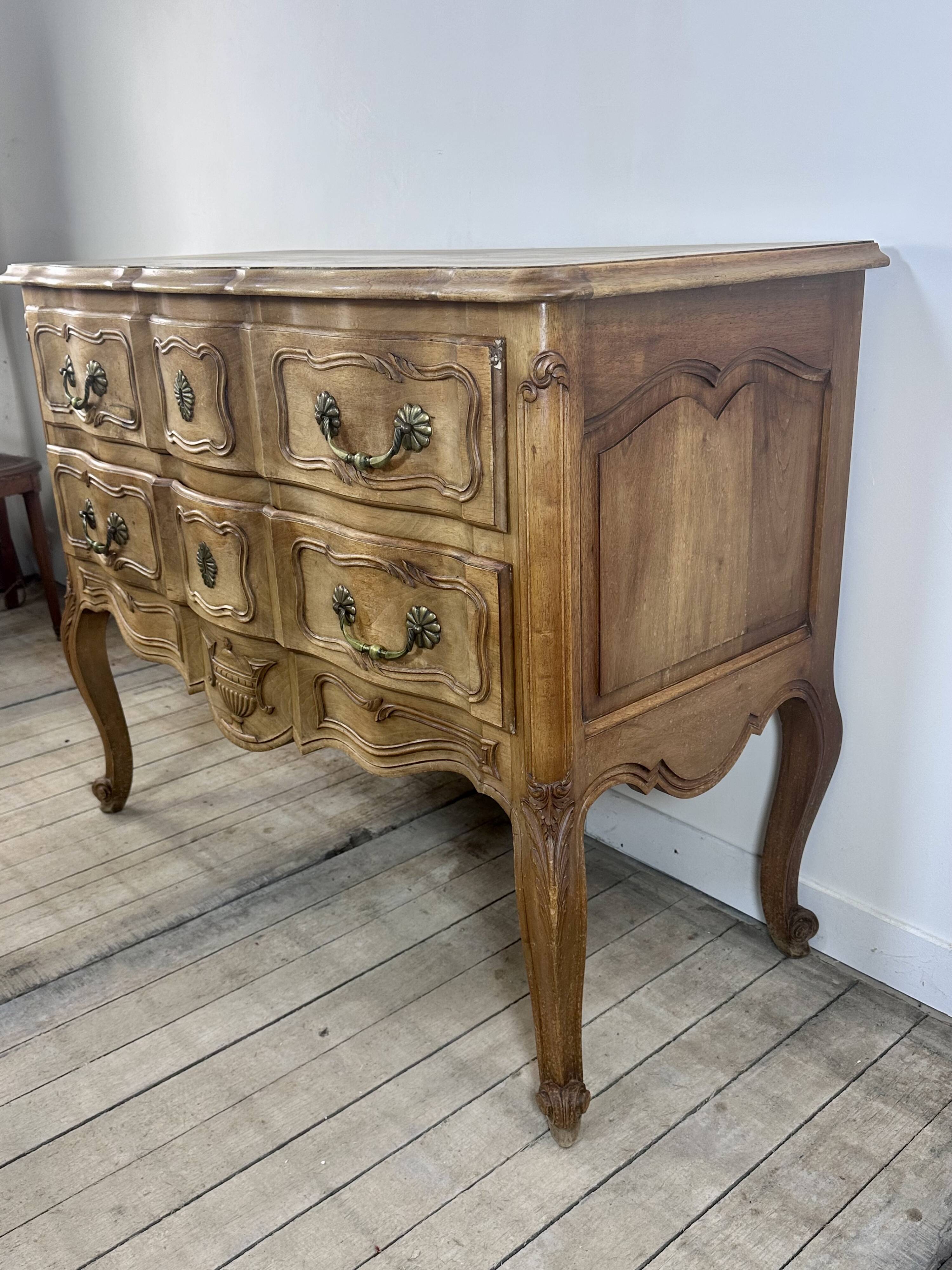 Louis XV style chest of drawers in carved wood