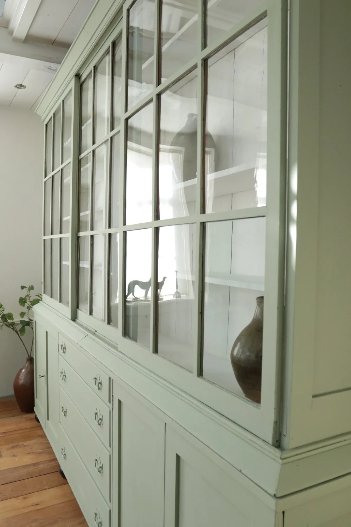 Large green display cabinet with sliding doors – two-part buffet, 219 cm