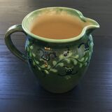 Large pitcher with floral decoration