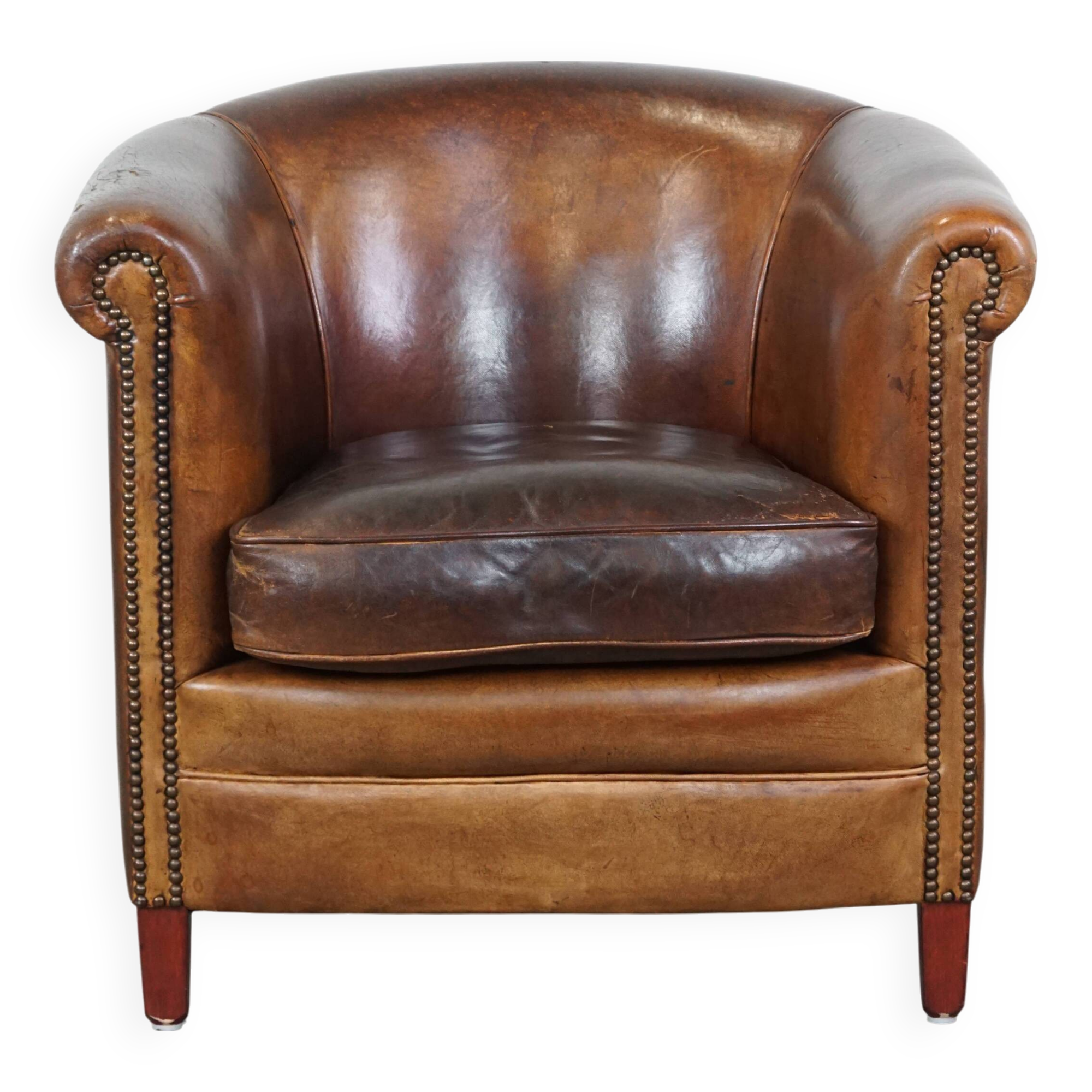 Fauteuil club en cuir de mouton couleur cognac
