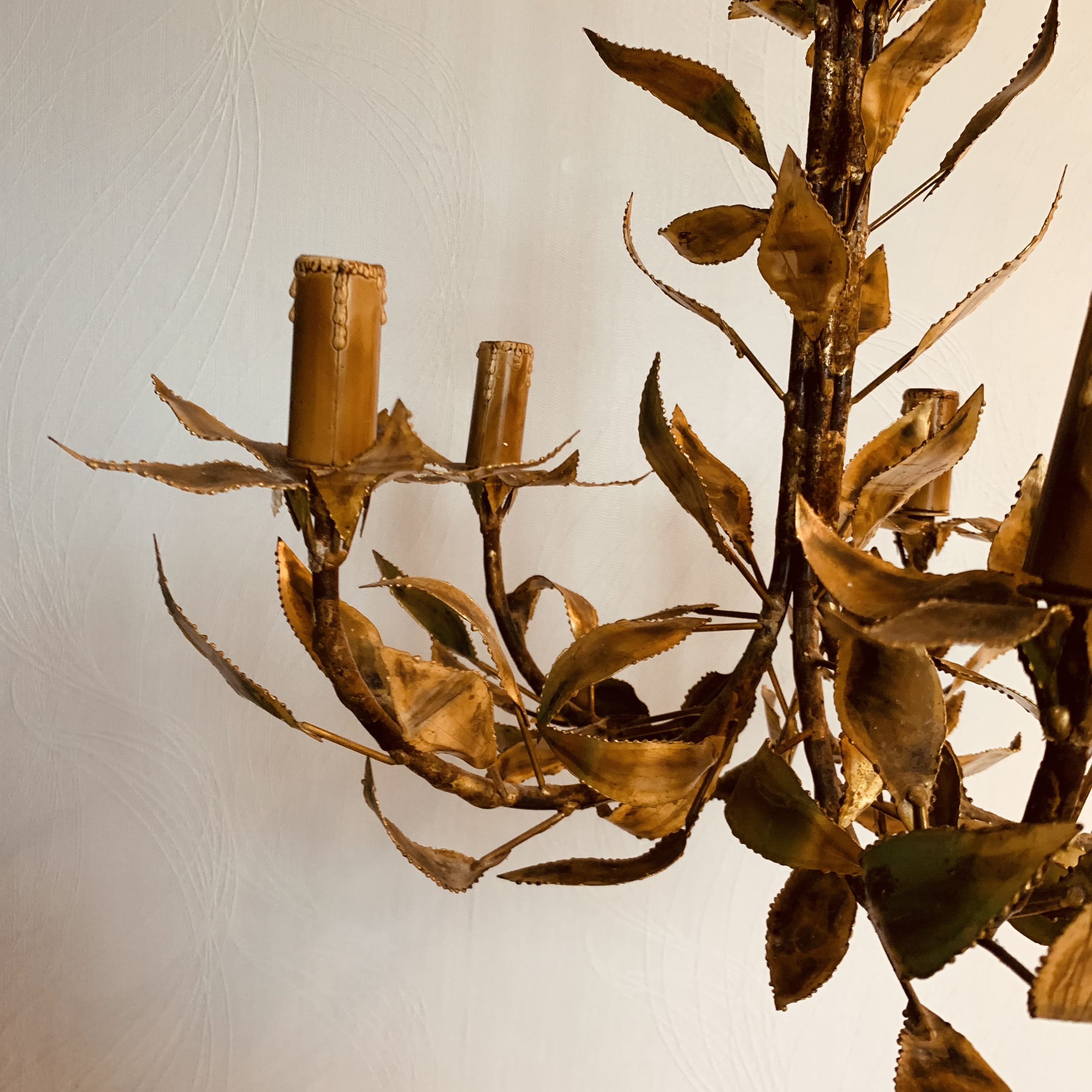 Vintage chandelier foliage decoration
