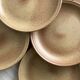 Set of 10 brown speckled stoneware plates