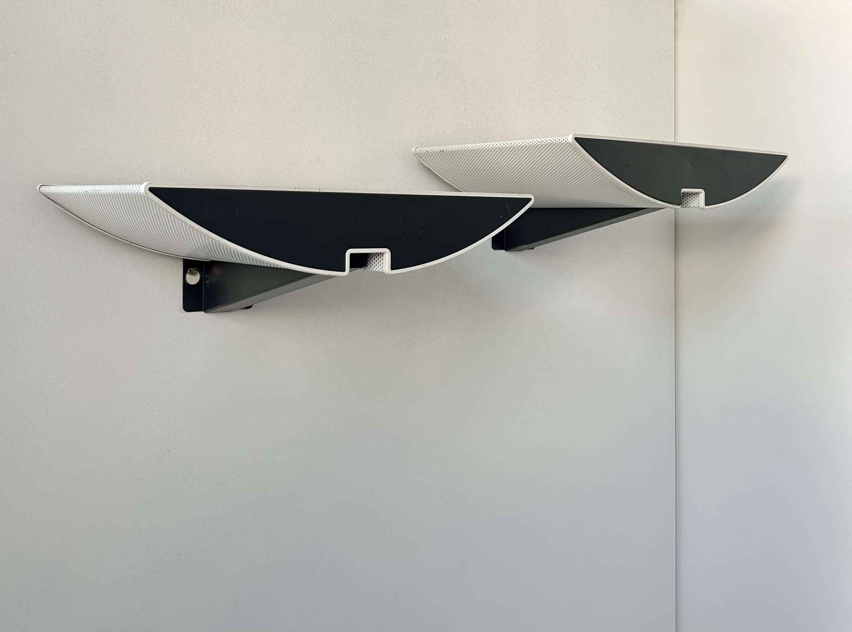 Pair of modernist wall lights, black and white lacquered metal, Italy 1980