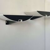 Pair of modernist wall lights, black and white lacquered metal, Italy 1980