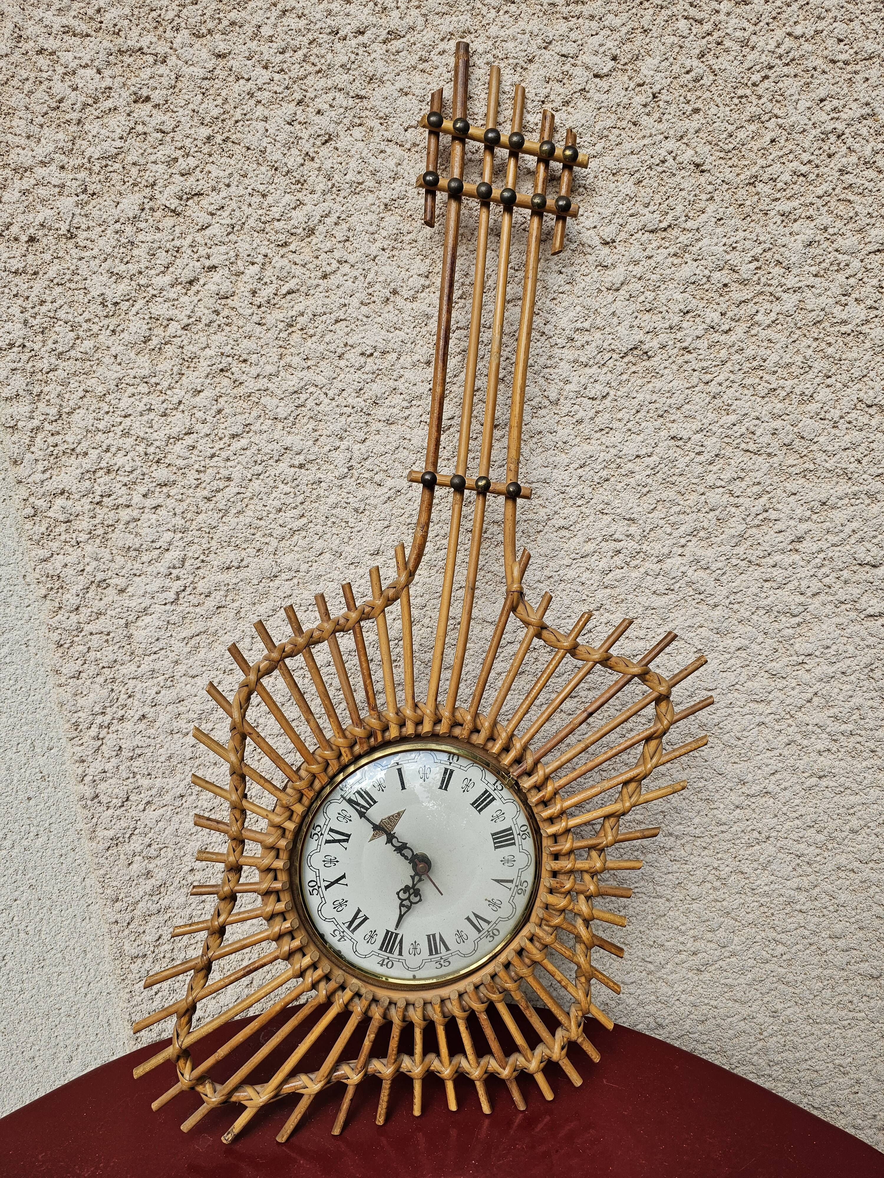Vintage decorative wall clock Guitar in rattan bohemian style 77 cm - 1970s