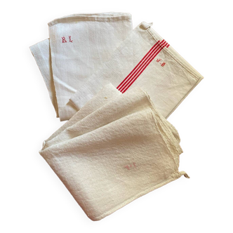 3 different old tea towels.