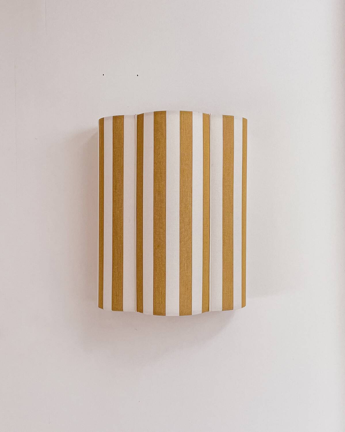 Yellow striped fabric wall light