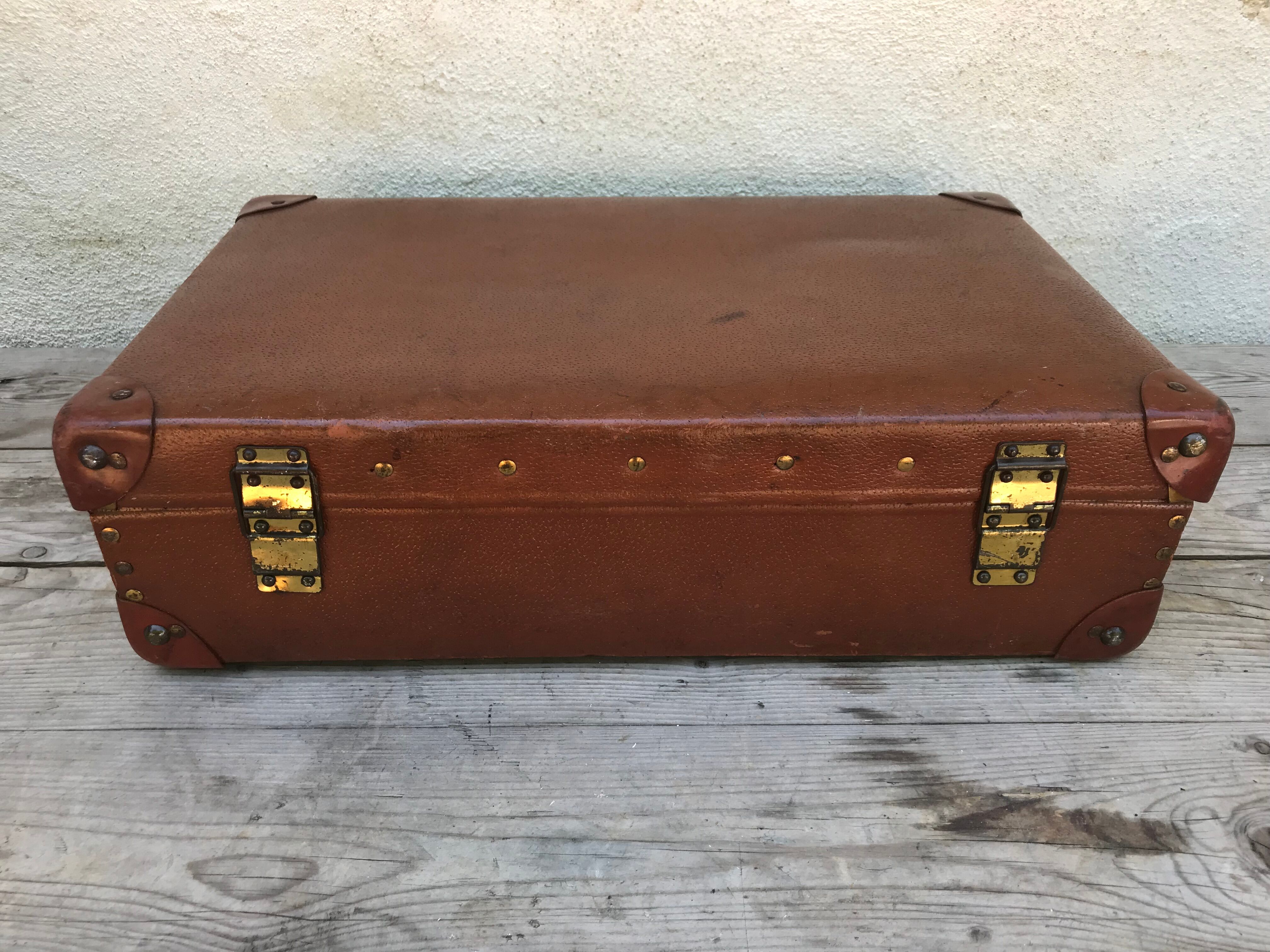 Old suitcase travel ultima brown fiber trunk