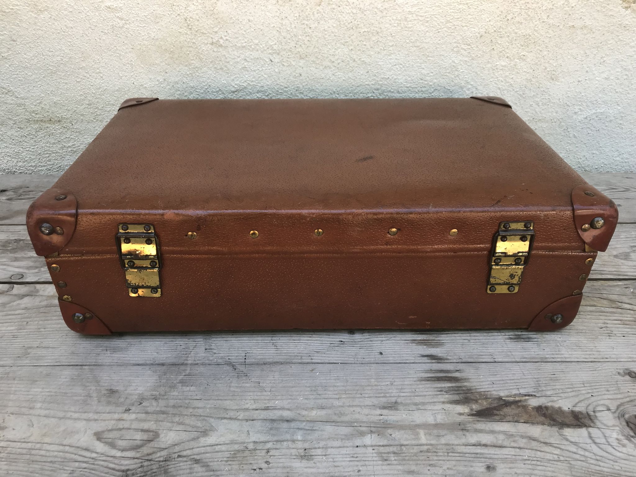 Old suitcase travel ultima brown fiber trunk