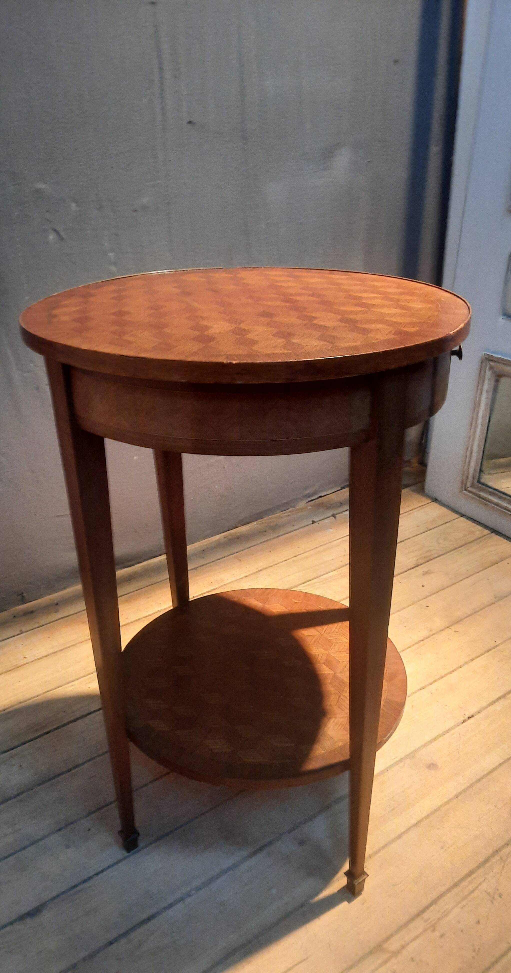 Round marquetry pedestal table with 2 shelves